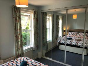 Ένα ή περισσότερα κρεβάτια σε δωμάτιο στο The Burnham House