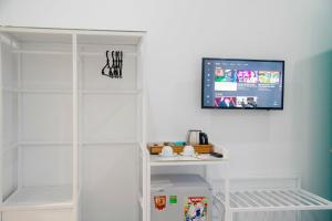TV a/nebo společenská místnost v ubytování Philip Bungalow