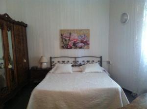 Postel nebo postele na pokoji v ubytování Hotel Pensione Moderna