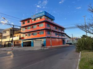 a building on the side of a street at Hotel Suntuoso in Brasilia