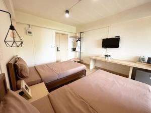 TV a/nebo společenská místnost v ubytování I-Home Residence and Hotel