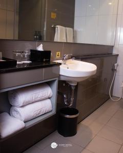 Koupelna v ubytování Ivory Hotel Bandung