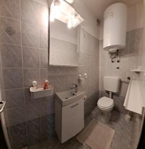 Koupelna v ubytování Apartments Mari