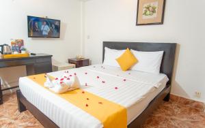 Best Central Point Hotel客房内的一张或多张床位