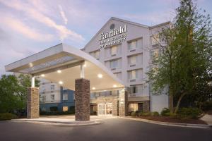 a rendering of a hotel with a building at Fairfield Inn & Suites Raleigh Durham Airport Research Triangle Park in Morrisville