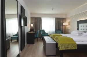 Säng eller sängar i ett rum på Thon Hotel Oslofjord