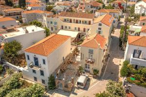 an aerial view of a town with houses at Kastro Hotel in Spetses
