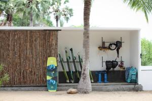 a group of surfboards are leaning against a wall at Anawasal in Kalpitiya