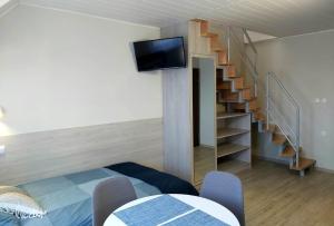 TV a/nebo společenská místnost v ubytování Mila