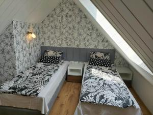 Postel nebo postele na pokoji v ubytování Mila