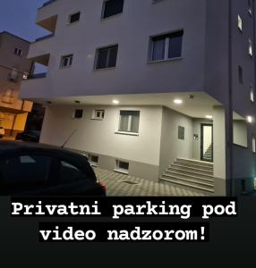 a building with a car parked in front of it at Villa Kap in Zagreb