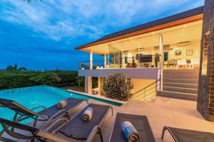 an image of a house with a swimming pool at Phu Montra Villa with Ocean View in Khao Tao