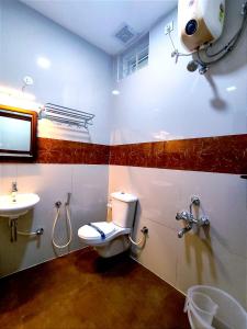 Een badkamer bij Hotel GVS Residency