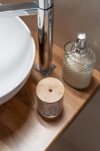 a counter top with a sink and aaucet with aaucet at Areti InCreteble Cretan Residences Collection in Sitia