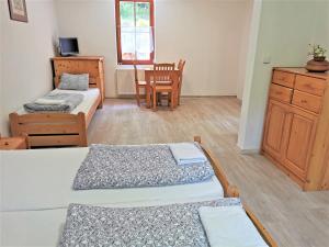 Postel nebo postele na pokoji v ubytování Penzion Liškův Mlýn