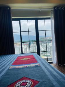Postel nebo postele na pokoji v ubytování Moonlight Hotel Sa Pa