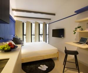 TV a/nebo společenská místnost v ubytování Coliwoo Keppel - CoLiving
