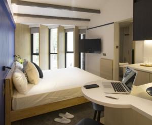 TV a/nebo společenská místnost v ubytování Coliwoo Keppel - CoLiving