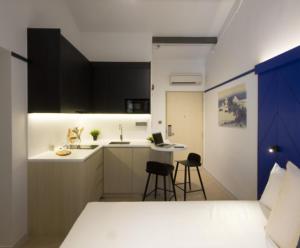 Kuchyň nebo kuchyňský kout v ubytování Coliwoo Keppel - CoLiving