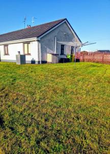 Сад в Wild Atlantic Haven, cosy home nr. Ballina & Beach +33 фотографии