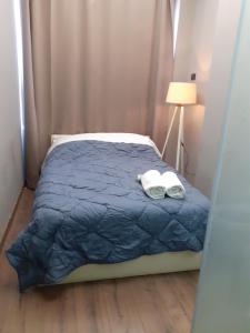 Hotel Driti New Bazaar房間的床