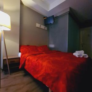 Hotel Driti New Bazaar房間的床