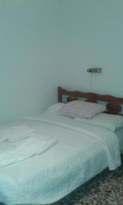 Ліжко або ліжка в номері Manoleas Rooms to Let
