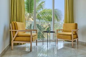 Istumisnurk majutusasutuses Fig House Anjuna-Chapora Road , Siolim 1BHK Suite