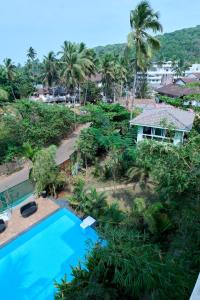 una vista aérea de un complejo con piscina en Fig House Anjuna-Chapora Road , Siolim 1BHK Suite en Oxel