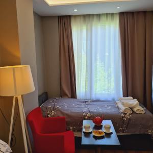 Hotel Driti New Bazaar房間的床