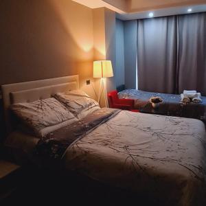 Hotel Driti New Bazaar房間的床
