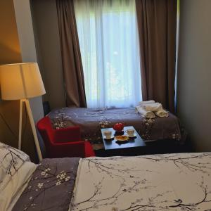 Hotel Driti New Bazaar房間的床