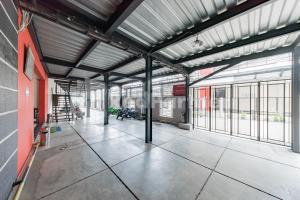 Das Fitnesscenter und/oder die Fitnesseinrichtungen in der Unterkunft Maleo Residence Bandung Mitra RedDoorz