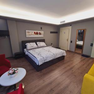 Postel nebo postele na pokoji v ubytování Hotel Driti New Bazaar + 24 fotografií