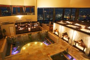 an aerial view of a hotel lobby with a pool at Hotel Amandi in Nagasaki