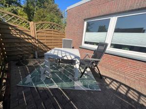 Balkón nebo terasa v ubytování Hooge Hörn Bantje Wohnung 3