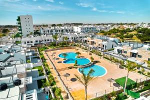 an aerial view of a resort with two pools at Apartment Comfort Zone 2 in Pilar de la Horadada