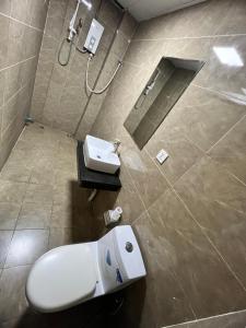 Koupelna v ubytování Yaou Hotel