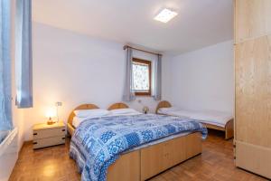 Ένα ή περισσότερα κρεβάτια σε δωμάτιο στο Residenza al Villaggio