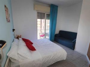 Postel nebo postele na pokoji v ubytování Hotel Giannella