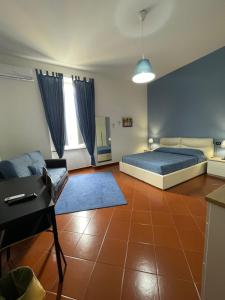 Posteľ alebo postele v izbe v ubytovaní Dante Rooms