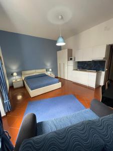 Posteľ alebo postele v izbe v ubytovaní Dante Rooms