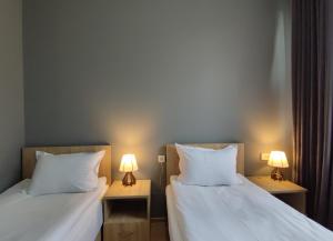 Letto o letti in una camera di Shanshe
