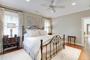 a bedroom with a bed and a ceiling fan at Homestead Lookout in Hot Springs