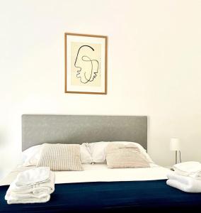 Postel nebo postele na pokoji v ubytování Marèe b&b
