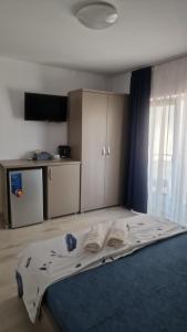 Postel nebo postele na pokoji v ubytování Breeze