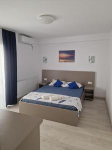 Postel nebo postele na pokoji v ubytování Breeze