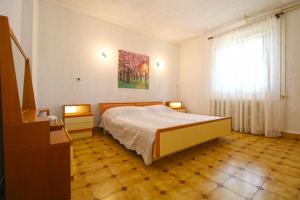 Postel nebo postele na pokoji v ubytování Apartment Mirjana 1906