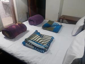 Katil atau katil-katil dalam bilik di Gonbo Guest House