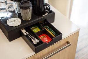 a drawer in a cabinet with a drawer at Courtyard by Marriott Vilnius City Center in Vilnius